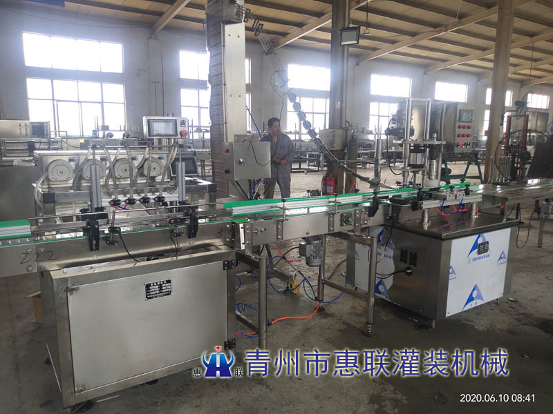 全自動奶茶灌裝封口機(jī) 全自動奶茶灌裝封口機(jī)