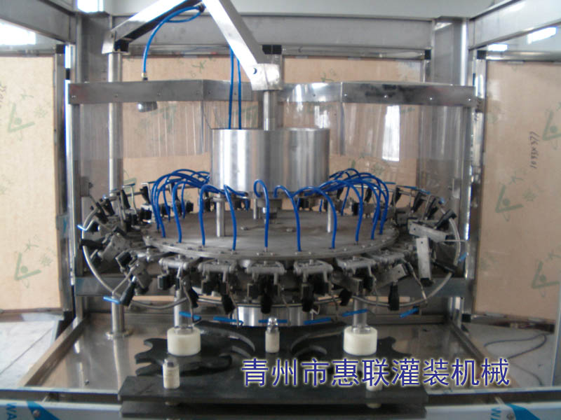 翻轉式?jīng)_瓶機 